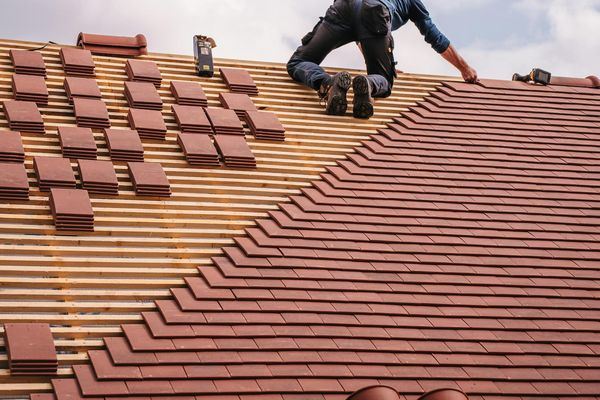Storm damage restoration and emergency roof repair services in Bryant Arkansas by Little Rock roofing contractor handling water damage restoration, roof replacement, and insurance claims