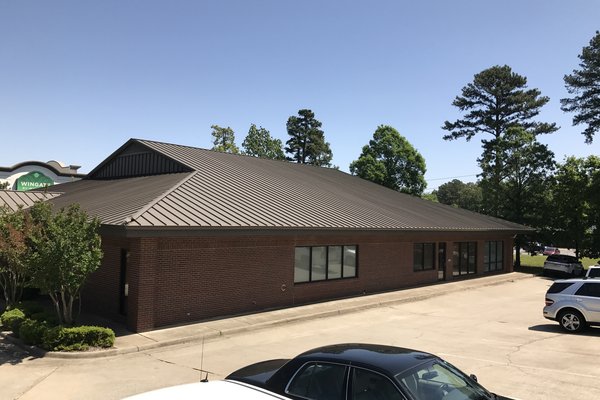 Metal roofing installation and emergency roof repair by Little Rock roofing contractor serving Bryant Arkansas with storm damage restoration, water damage restoration, roof replacement, and insurance claim services
