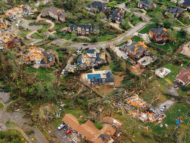 Storm damaged home in Bryant Arkansas needing emergency roof repair and restoration with roofing contractor from Little Rock handling water damage restoration and roof replacement insurance claim
