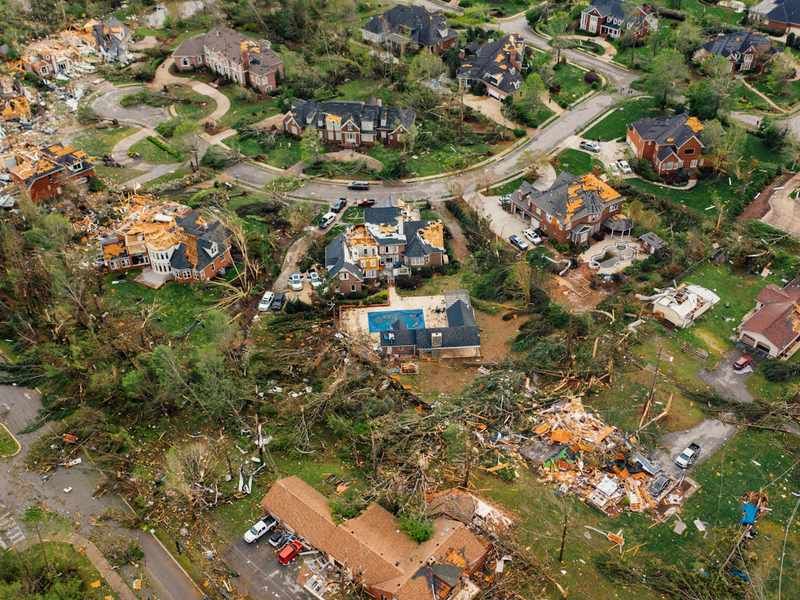 Storm damaged home in Bryant Arkansas needing emergency roof repair and restoration with roofing contractor from Little Rock handling water damage restoration and roof replacement insurance claim